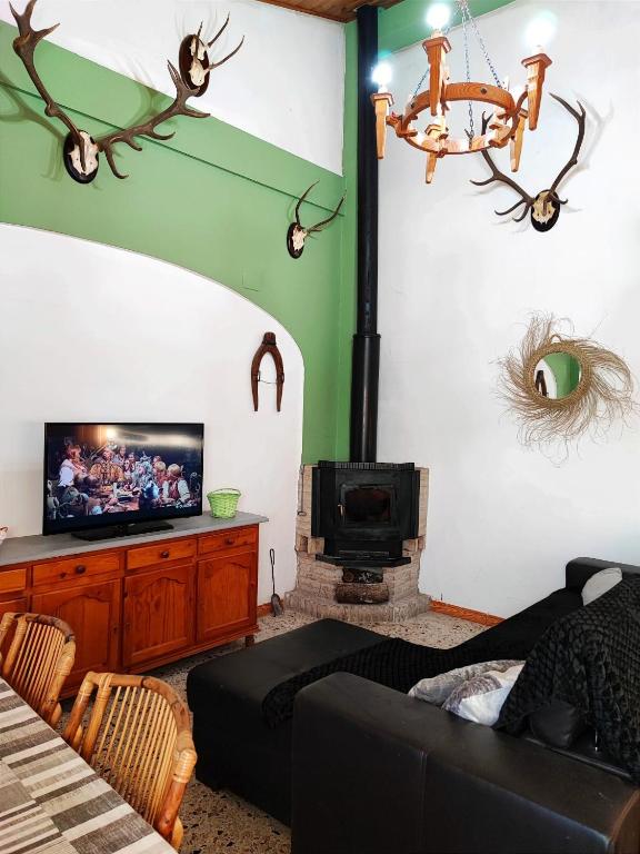 TV a/nebo společenská místnost v ubytování Casa Almadén 1