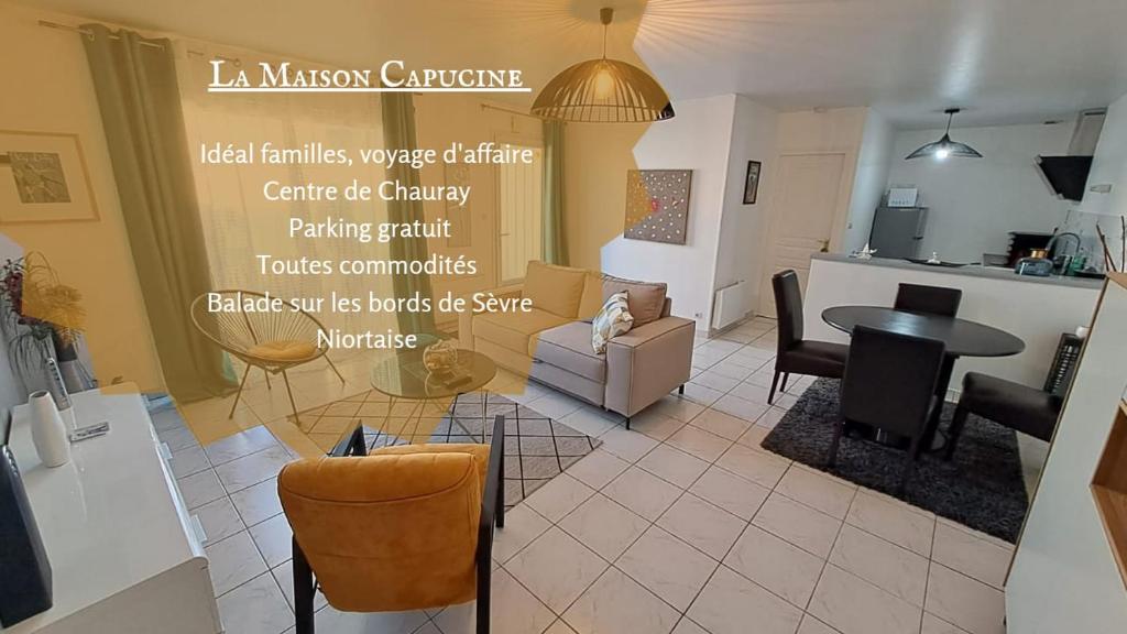 sala de estar con mesa y sillas en - Maison Capucine- Proche centre d'affaire Chauray, Jardin, parking, WIFI et Netflix, idéal voyage d'affaire, familles, ou simple escapade, en Chauray