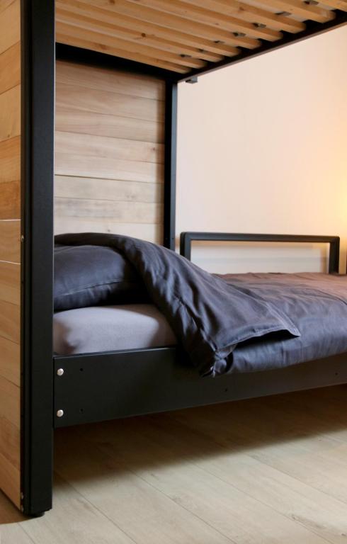 Postel nebo postele na pokoji v ubytování Residence 5