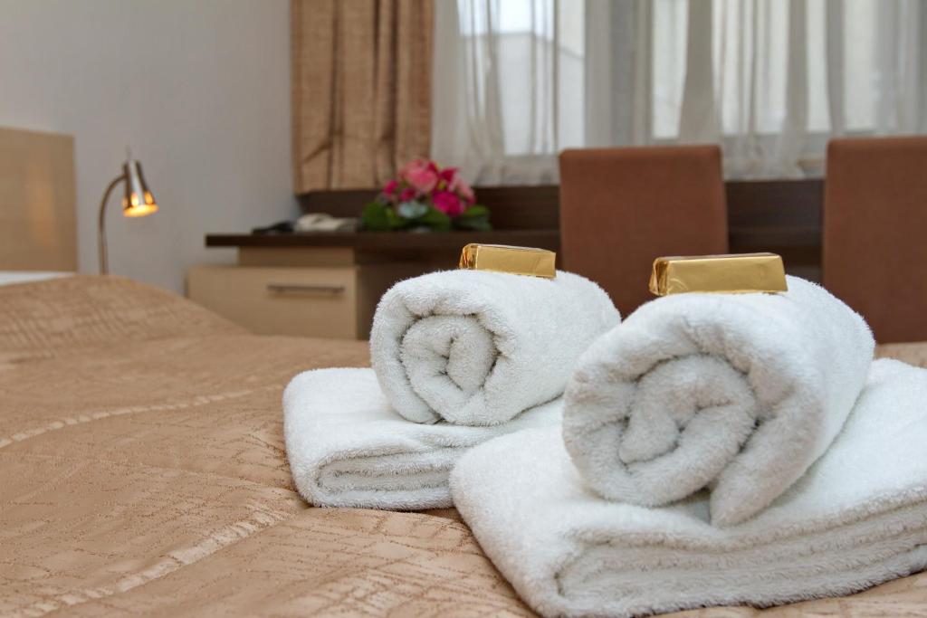 Postel nebo postele na pokoji v ubytování Hotel Expo