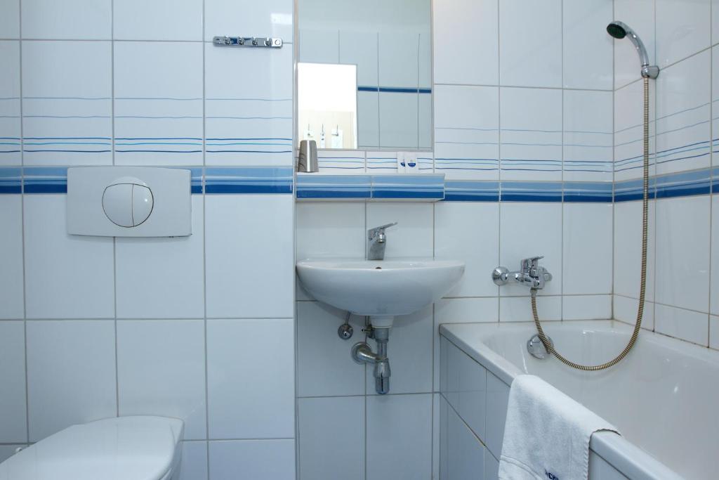 Koupelna v ubytování Hotel Expo