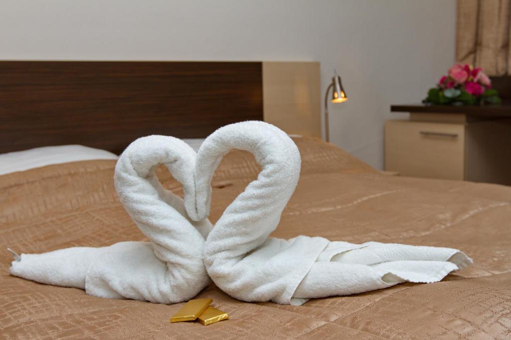 Postel nebo postele na pokoji v ubytování Hotel Expo