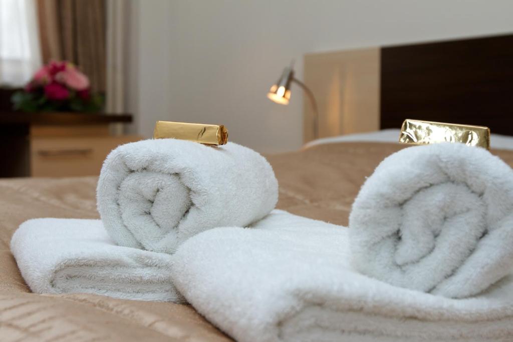 Postel nebo postele na pokoji v ubytování Hotel Expo