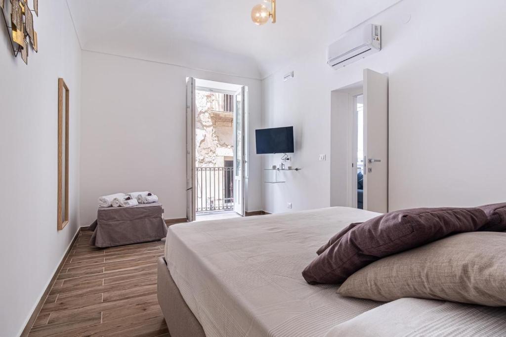 Posteľ alebo postele v izbe v ubytovaní FLOWER SUITE B&B