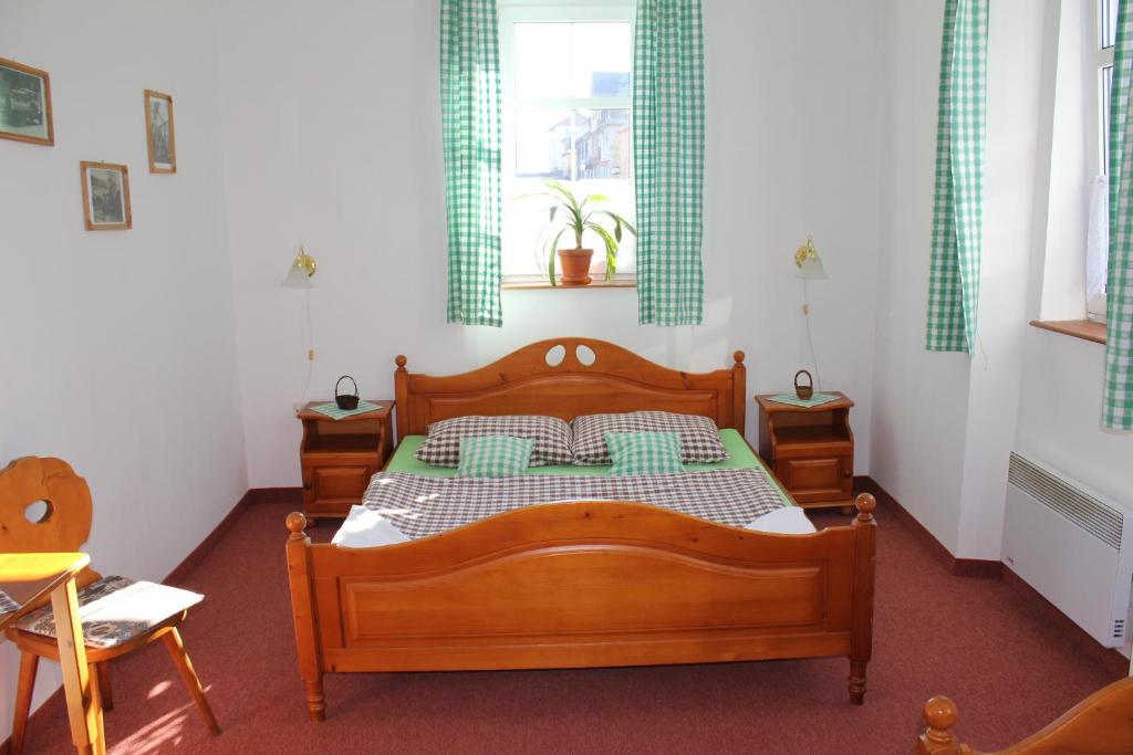 Postel nebo postele na pokoji v ubytování Hotel Svaty Hubert