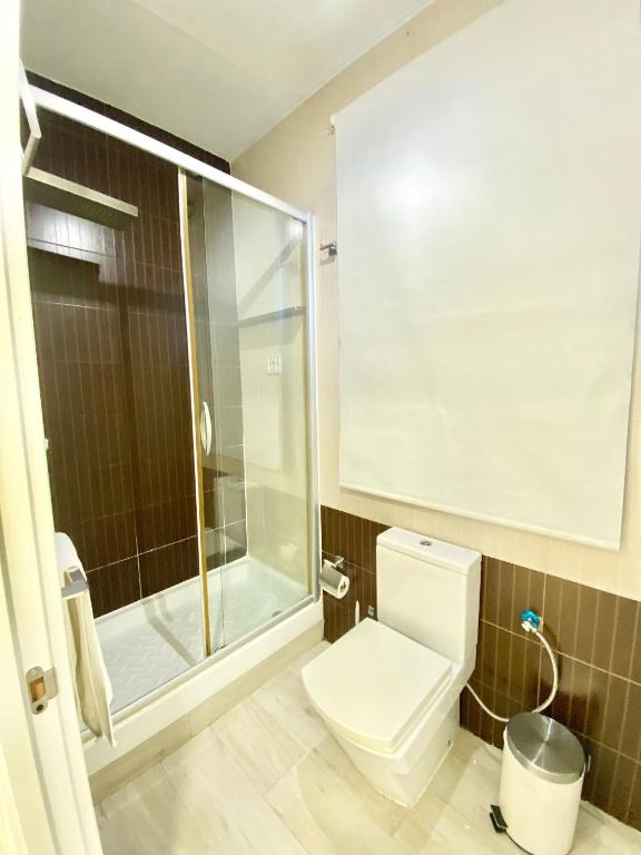 A bathroom at Piramides 1 Apartment