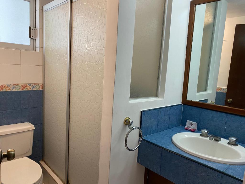 Koupelna v ubytování Hotel Suites Regina