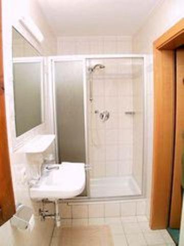 Koupelna v ubytování Hotel Garni Sonnenheim