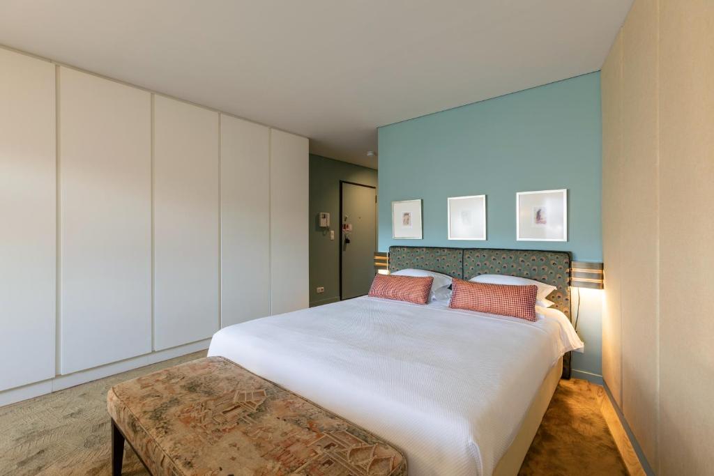 Postel nebo postele na pokoji v ubytování Urban Apartment Casa da Portela