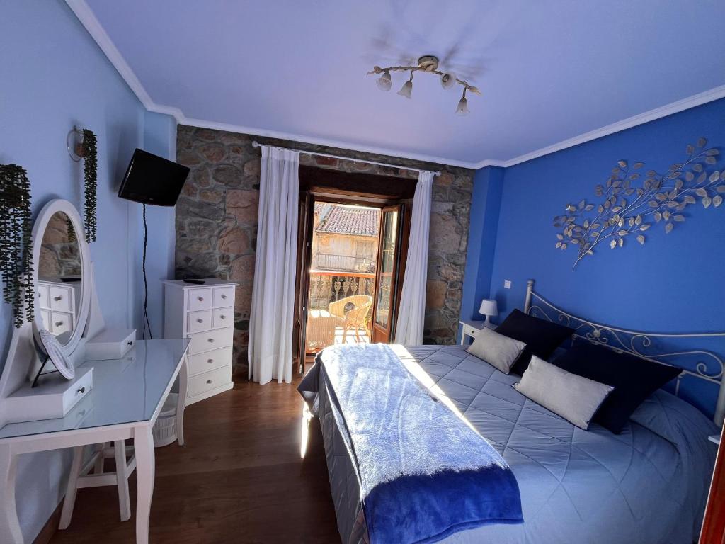 Postel nebo postele na pokoji v ubytování Posada de Villacarriedo