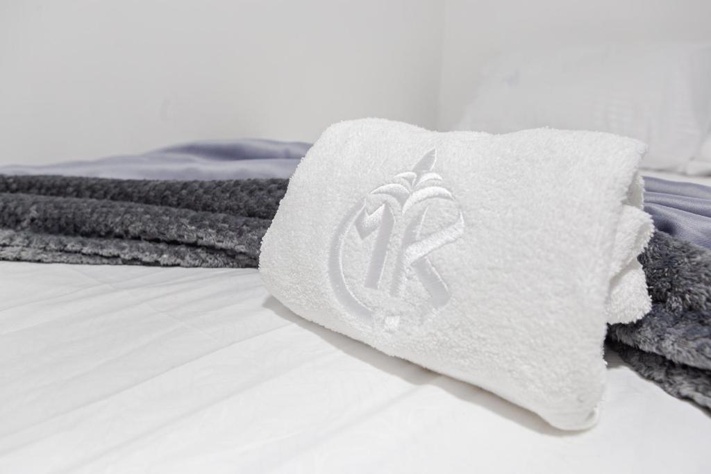 Postel nebo postele na pokoji v ubytování Markasa Hotel boutique