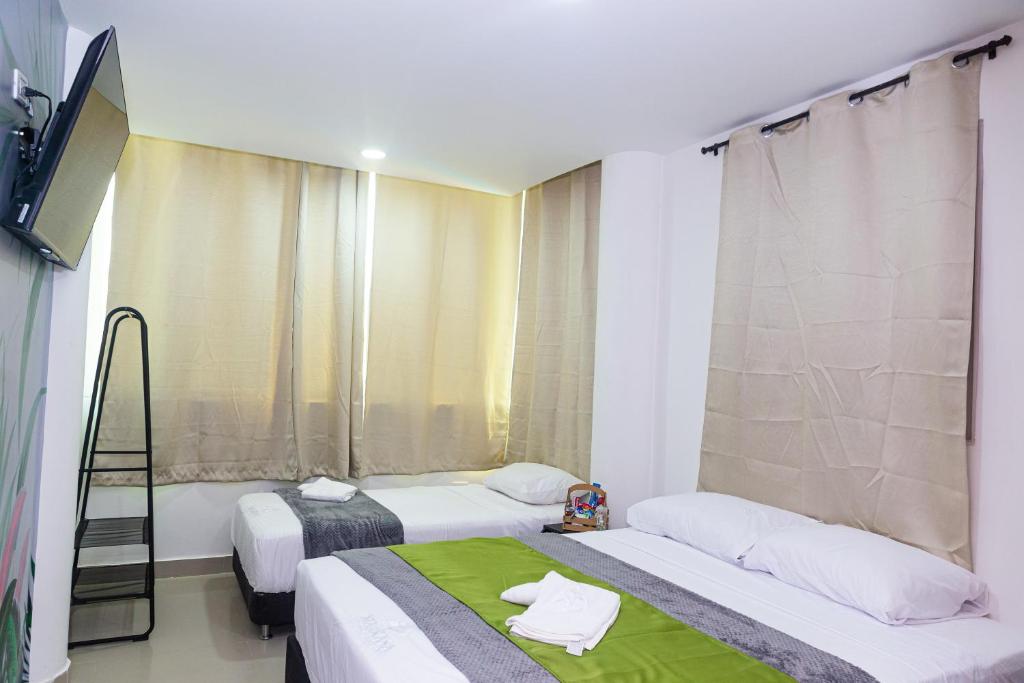 Postel nebo postele na pokoji v ubytování Markasa Hotel boutique
