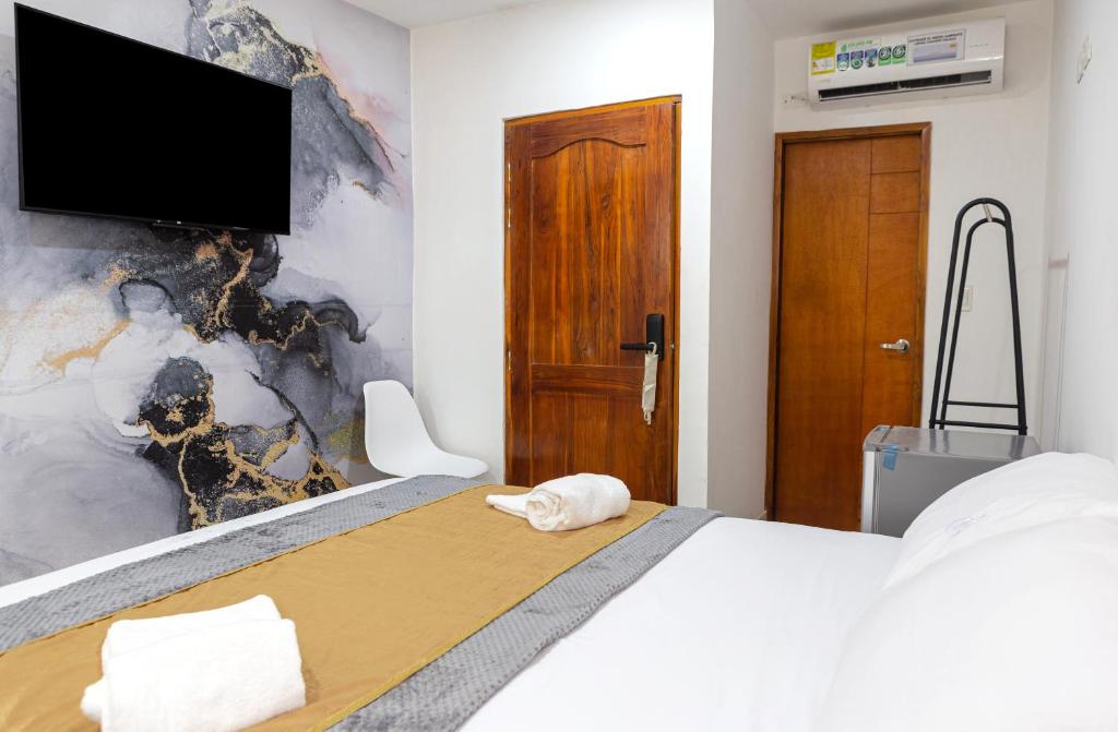 TV a/nebo společenská místnost v ubytování Markasa Hotel boutique