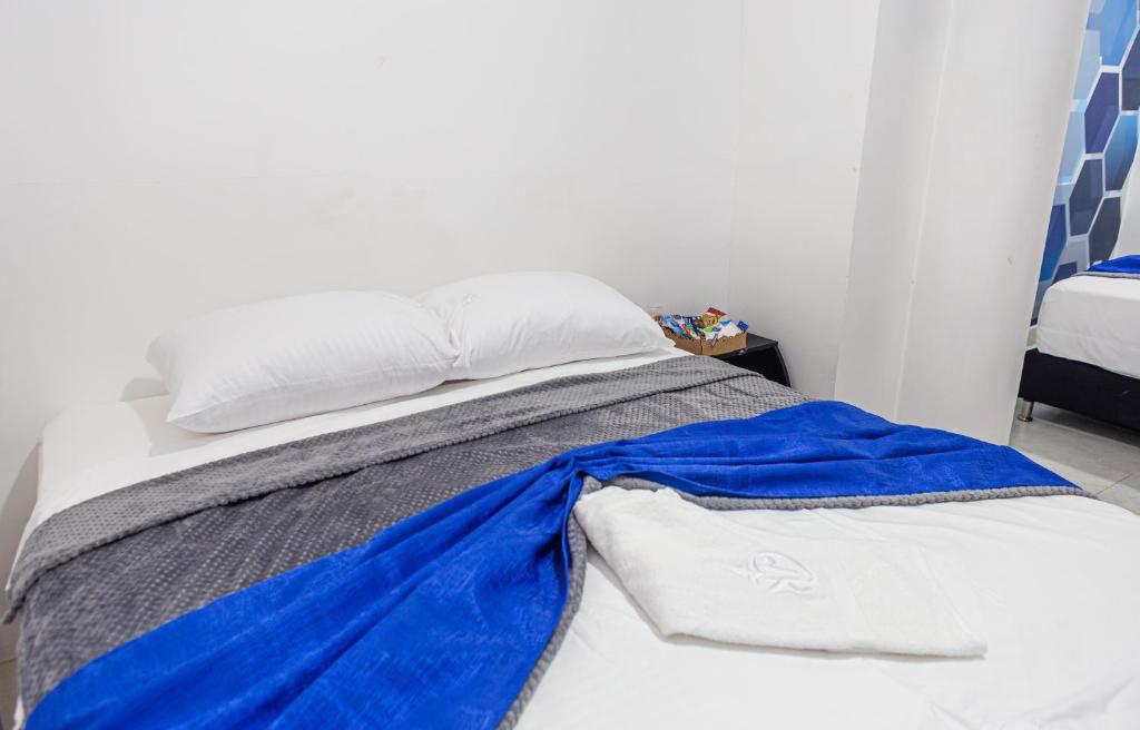 Postel nebo postele na pokoji v ubytování Markasa Hotel boutique