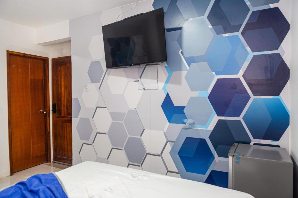 TV a/nebo společenská místnost v ubytování Markasa Hotel boutique