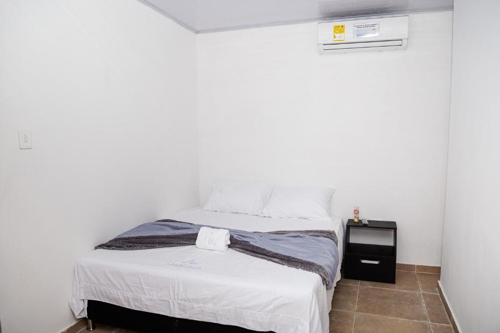 Postel nebo postele na pokoji v ubytování Markasa Hotel boutique