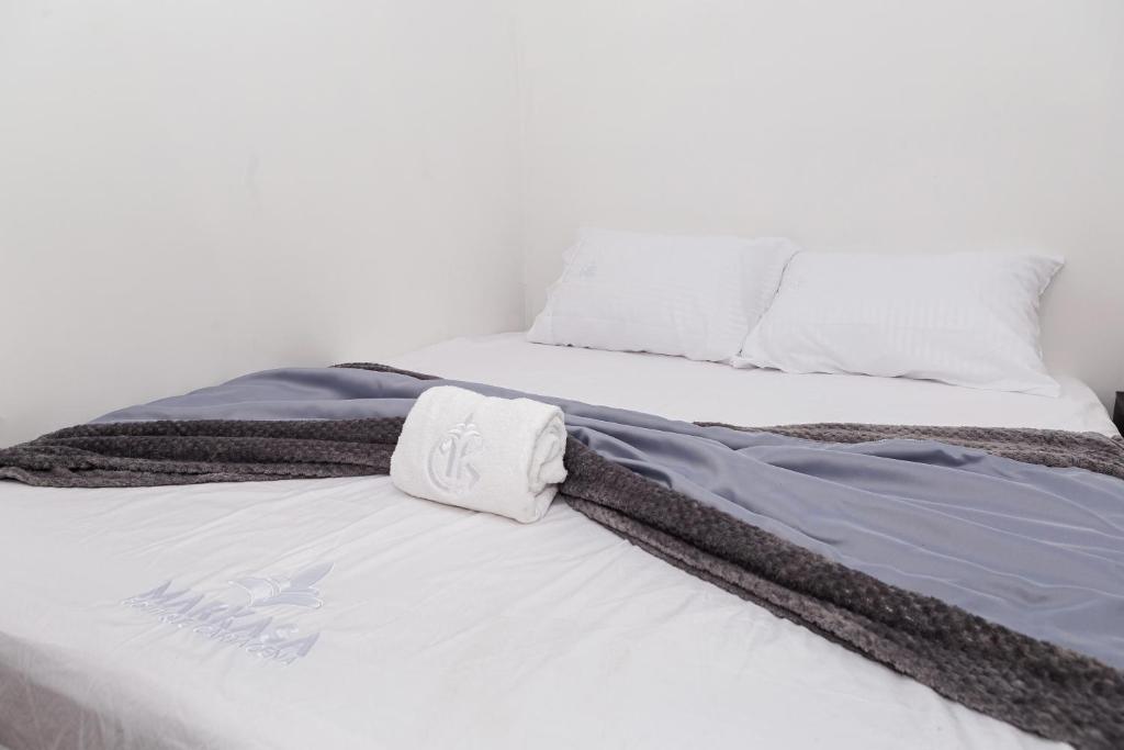 Postel nebo postele na pokoji v ubytování Markasa Hotel boutique
