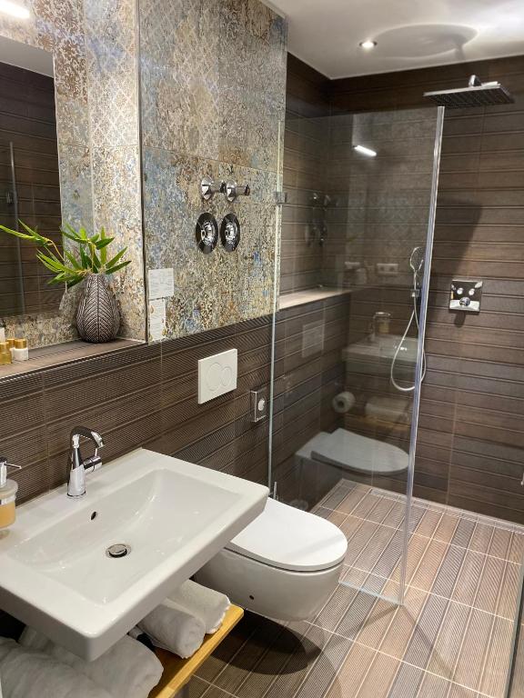 Koupelna v ubytování MARRAM Suitehotel