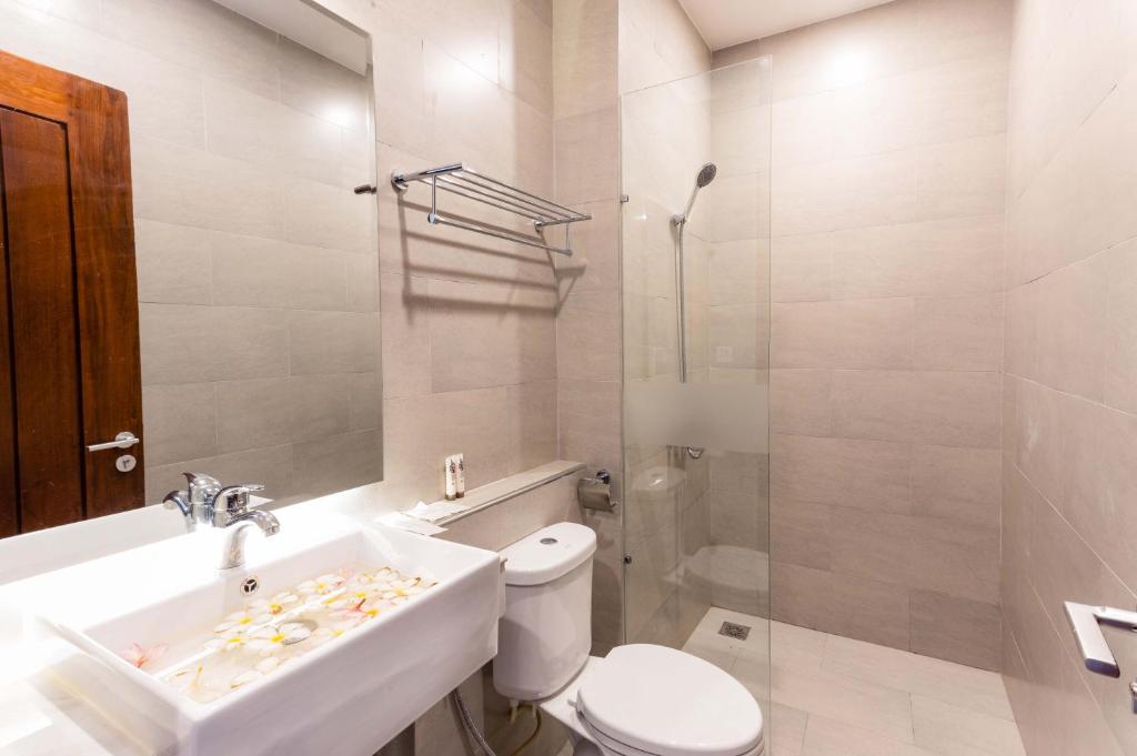 Koupelna v ubytování Joli Hotel