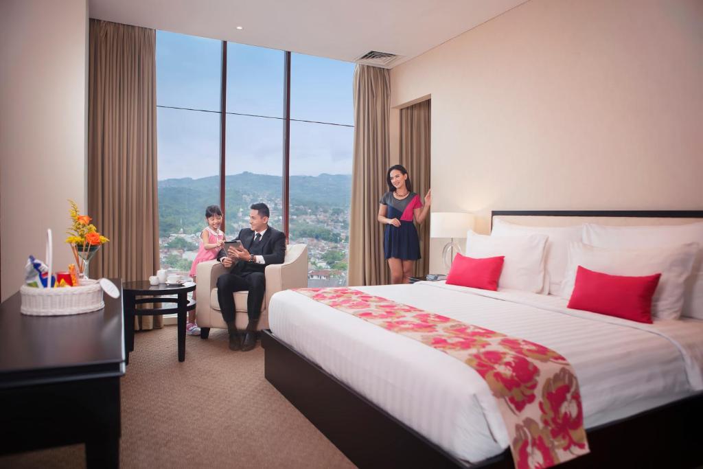 Postel nebo postele na pokoji v ubytování PRIME PARK Hotel Bandung