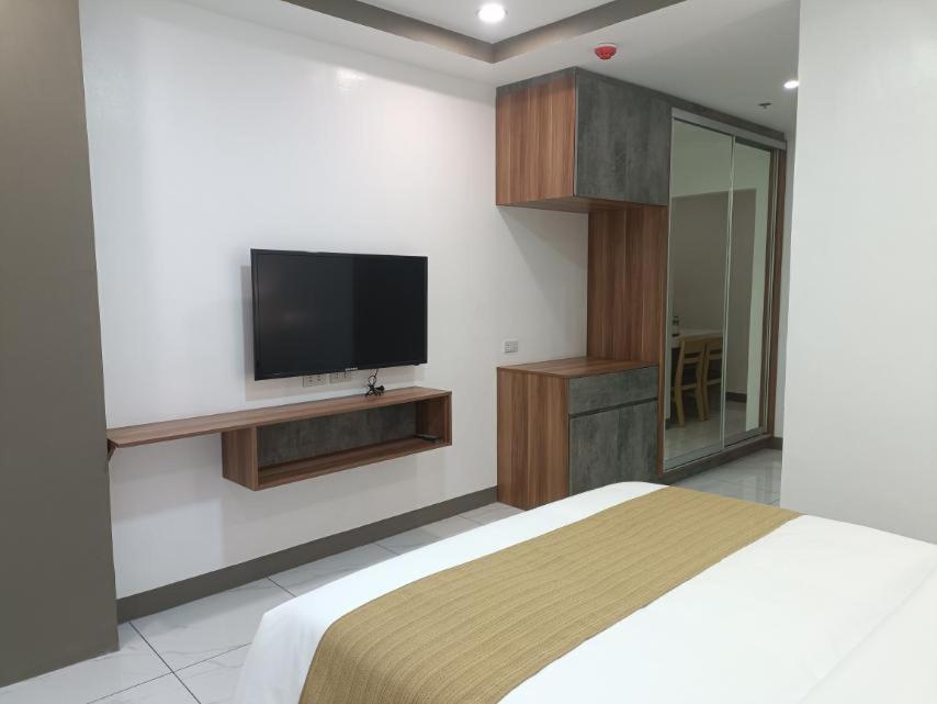 TV a/nebo společenská místnost v ubytování Rosh Hotel