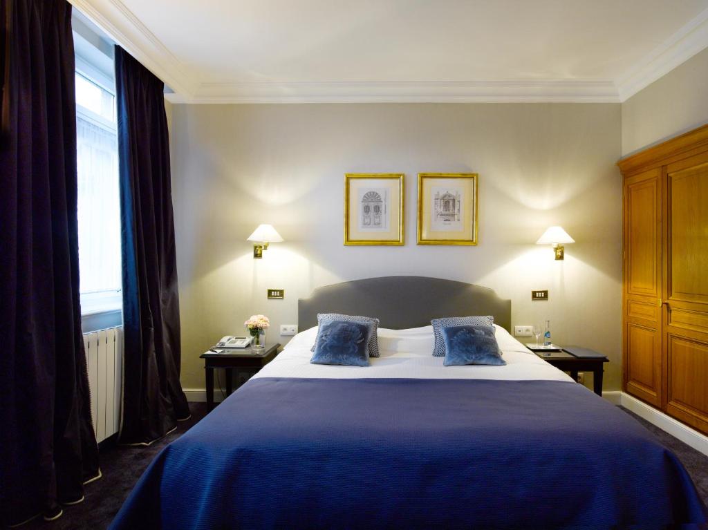 Postel nebo postele na pokoji v ubytování Hotel Damier Kortrijk