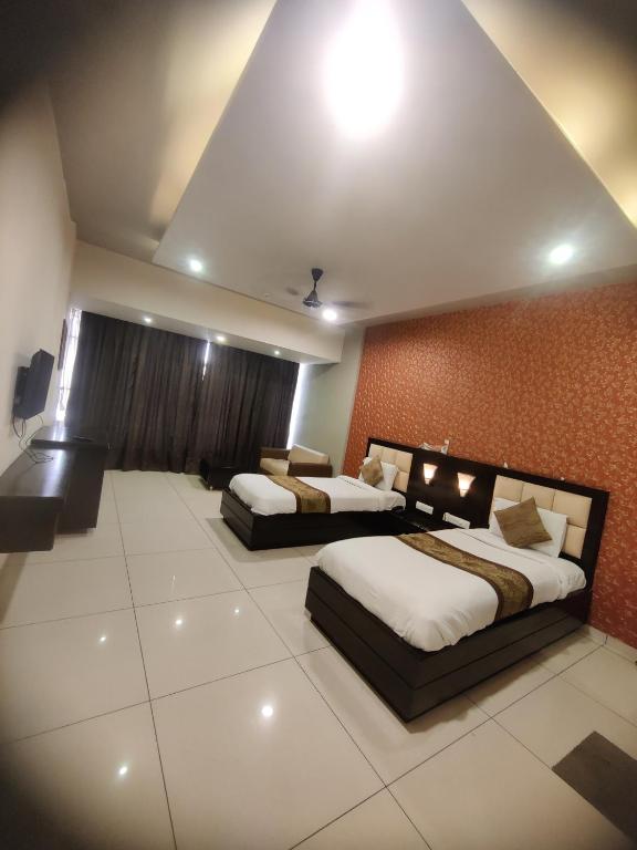 Postel nebo postele na pokoji v ubytování HOTEL RESTANDVIEW