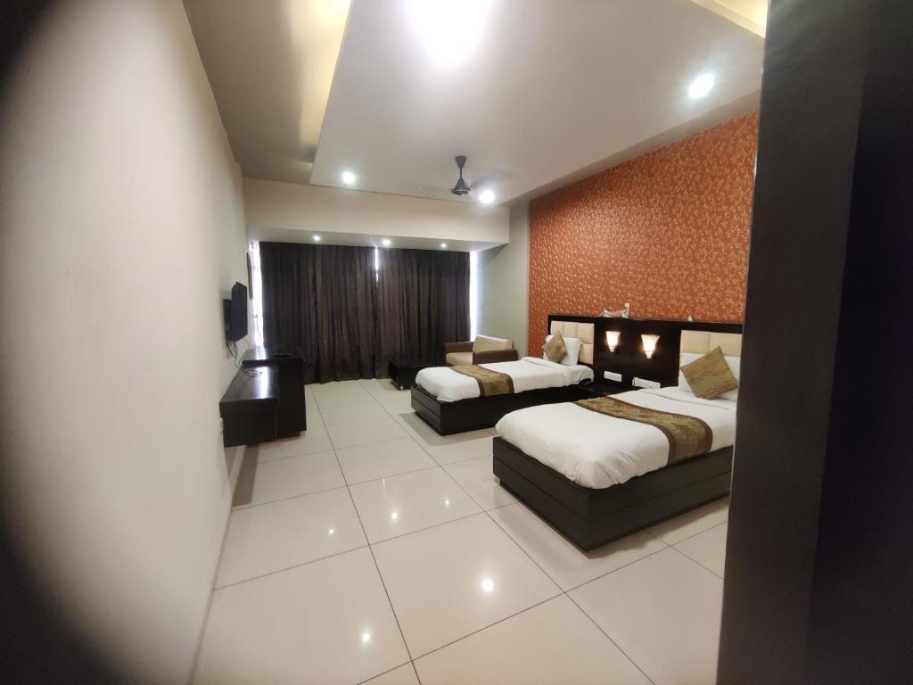 Postel nebo postele na pokoji v ubytování HOTEL RESTANDVIEW