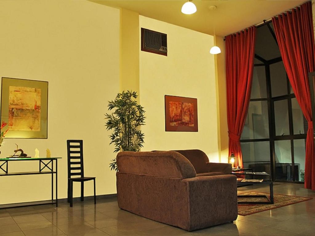Posezení v ubytování Scala Residence Hotel