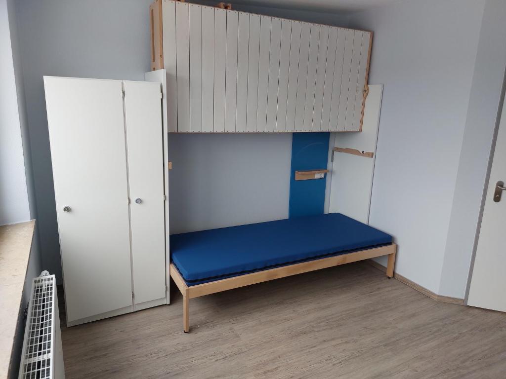 Postel nebo postele na pokoji v ubytování CVJM Freizeithaus MS Waterdelle