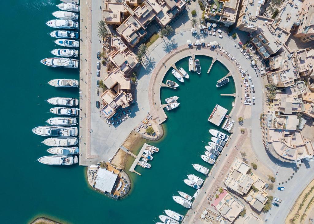 an aerial view of a marina with boats at Captain's Inn Hotel in Hurghada