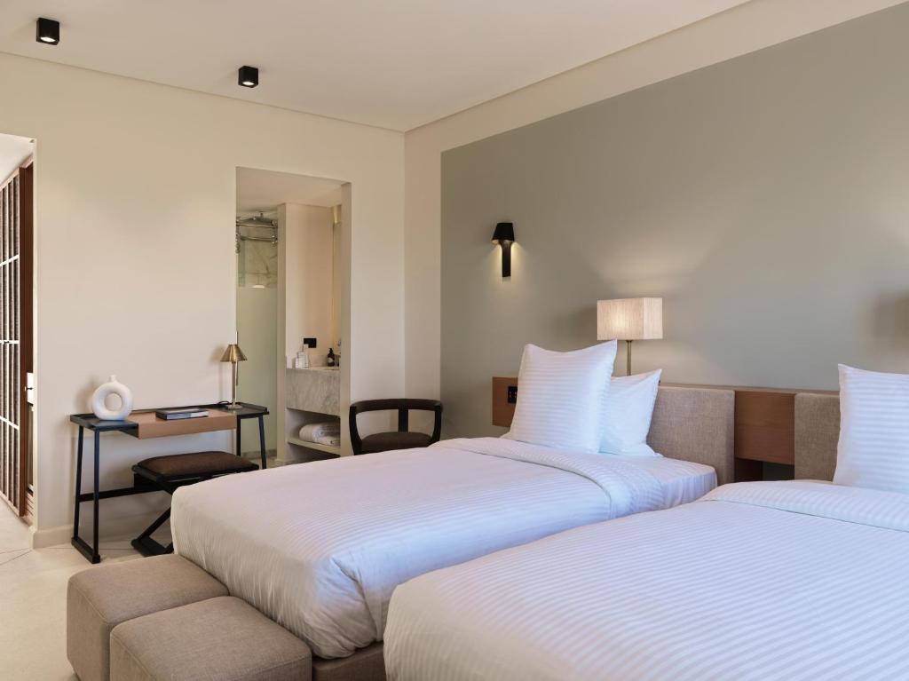 Кровать или кровати в номере The Chedi El Gouna