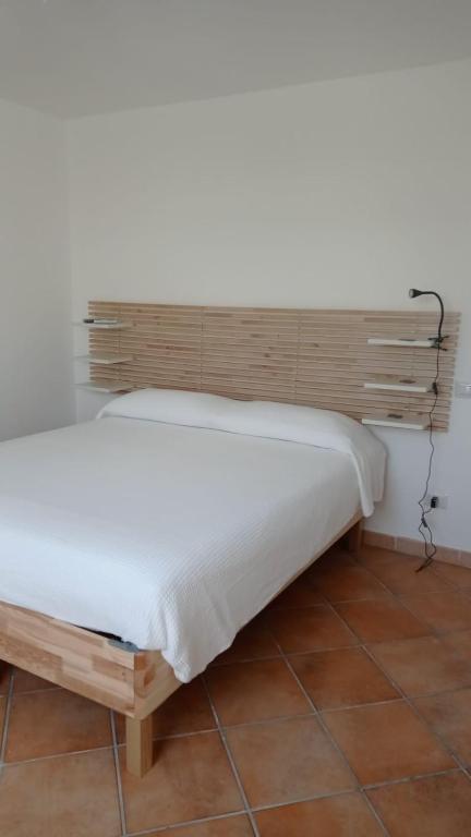 Postel nebo postele na pokoji v ubytování B&B Denteferro