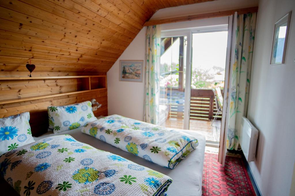 Postel nebo postele na pokoji v ubytování Apartments Krista