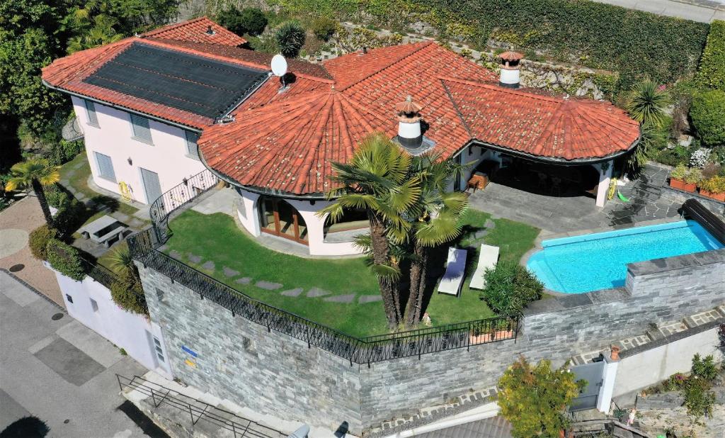 an overhead view of a house with a tile roof at La Paloma - a79627 in Brione sopra Minusio