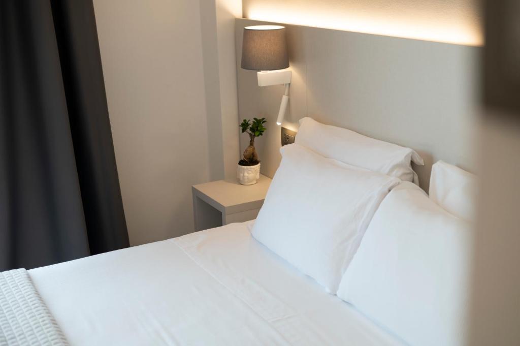 Кровать или кровати в номере Hotel Palace