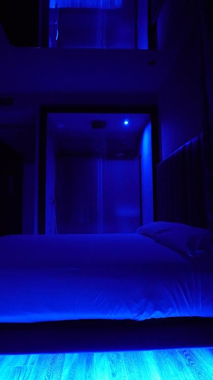 Postel nebo postele na pokoji v ubytování Leoni Hotel & Private Spa