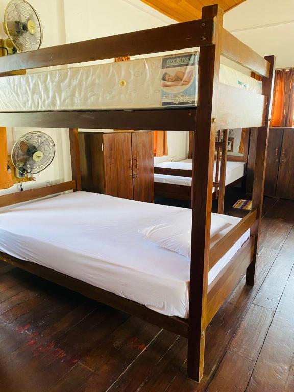 Postel nebo postele na pokoji v ubytování Tanty’s Hostel