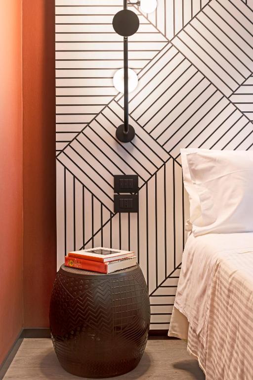 Uma cama ou camas num quarto em Quark Hotel Milano