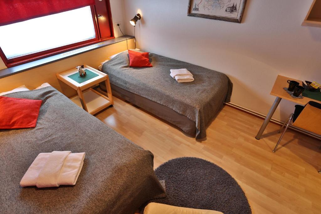 Postel nebo postele na pokoji v ubytování Ylläs Lake Hotel