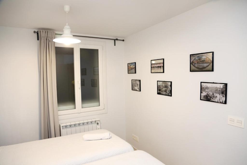 A bed or beds in a room at PISO REFORMADO FRENTE A LA CATEDRAL