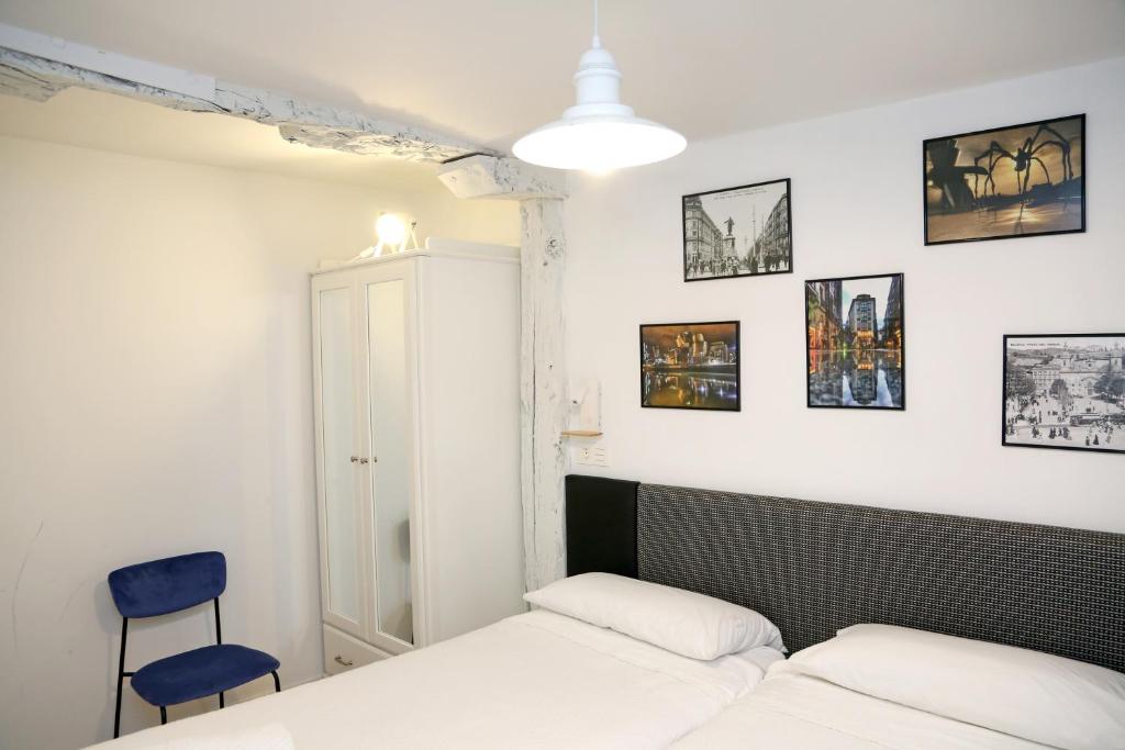 A bed or beds in a room at PISO REFORMADO FRENTE A LA CATEDRAL