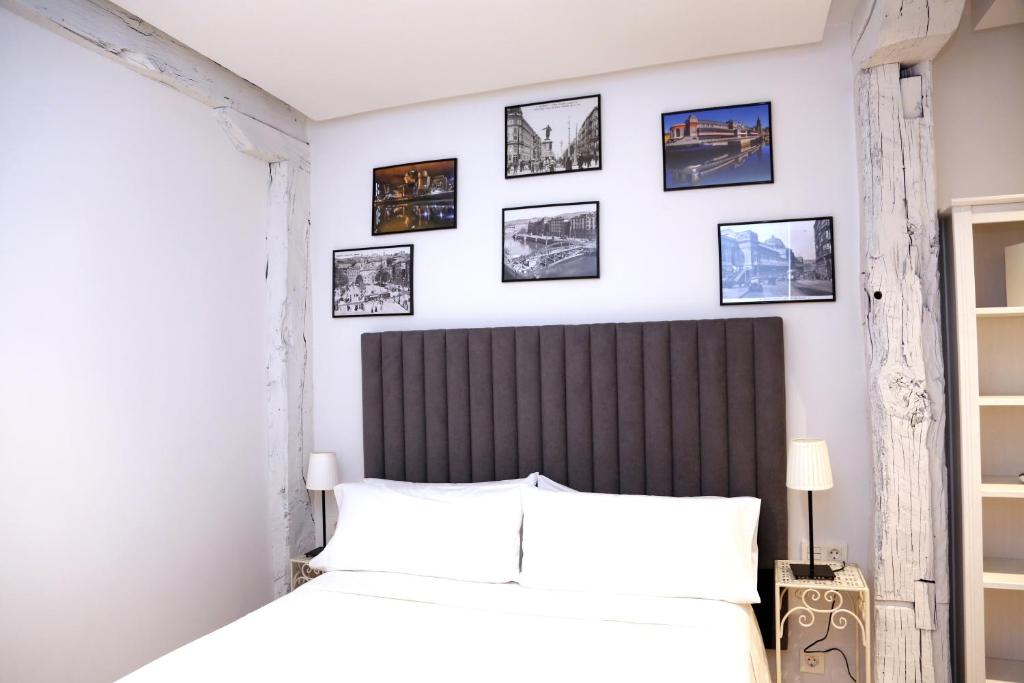 A bed or beds in a room at PISO REFORMADO FRENTE A LA CATEDRAL