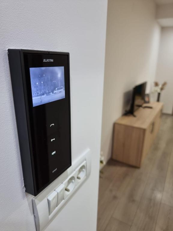 TV a/nebo společenská místnost v ubytování City Premium Apartments