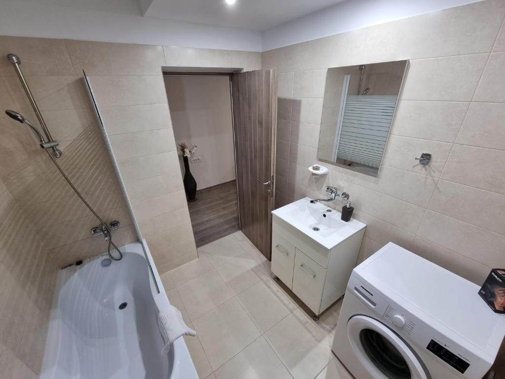 Koupelna v ubytování City Premium Apartments