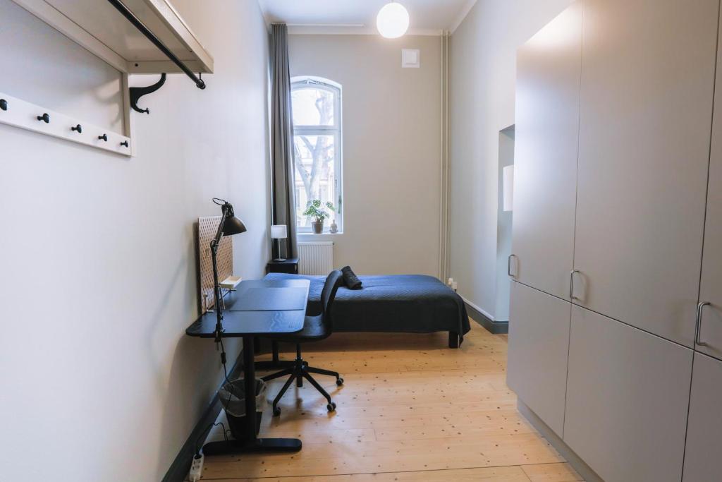 Postel nebo postele na pokoji v ubytování Holterman Hostel