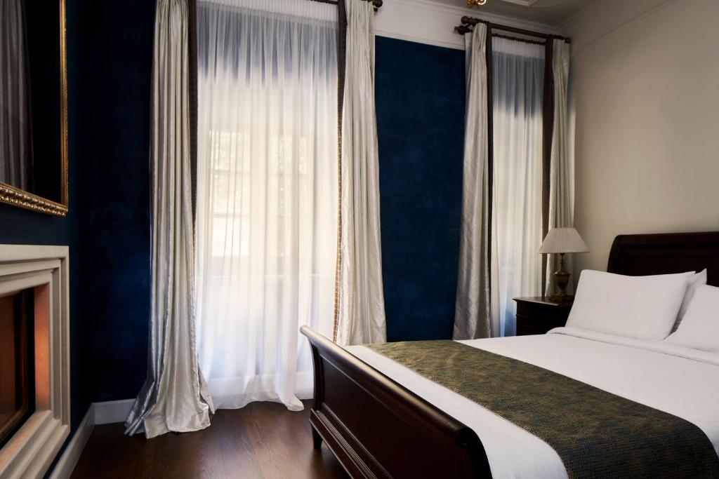 Postel nebo postele na pokoji v ubytování Hotel Ippoliti