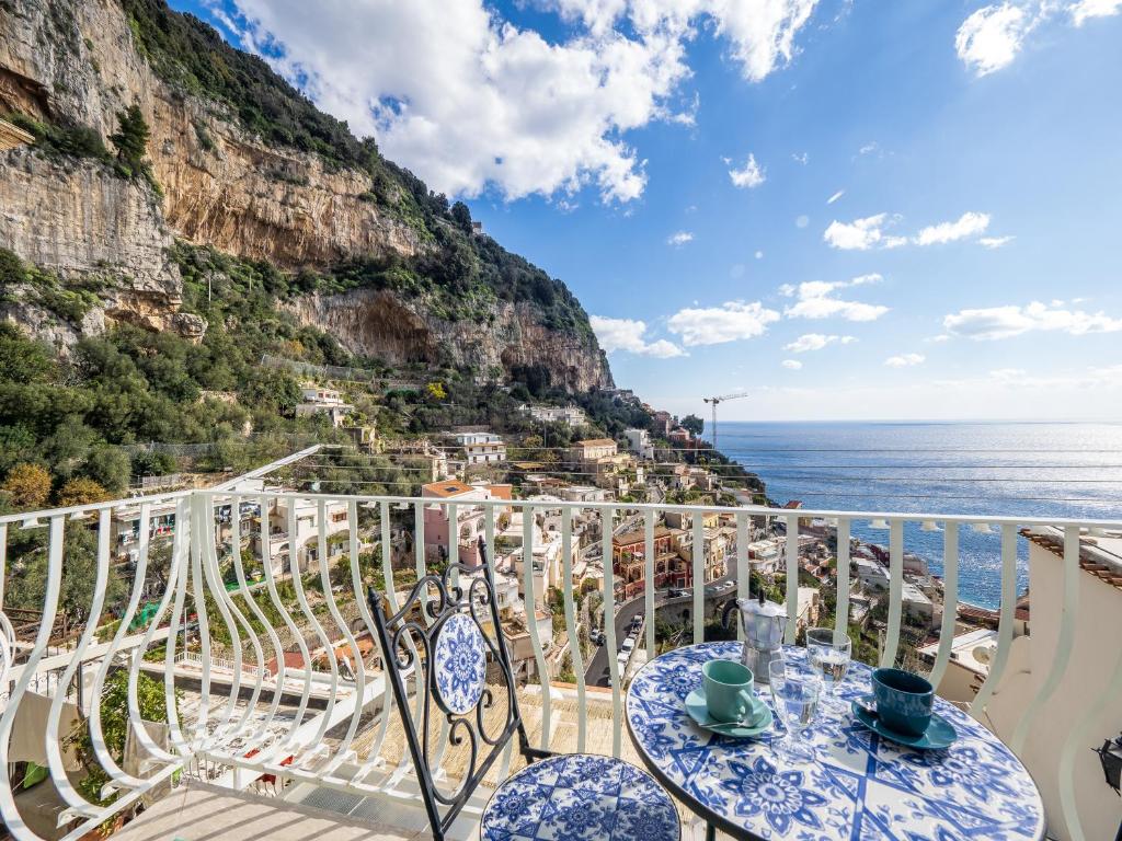 a balcony with a view of the amalfi coast at Artist House in Positano in Positano