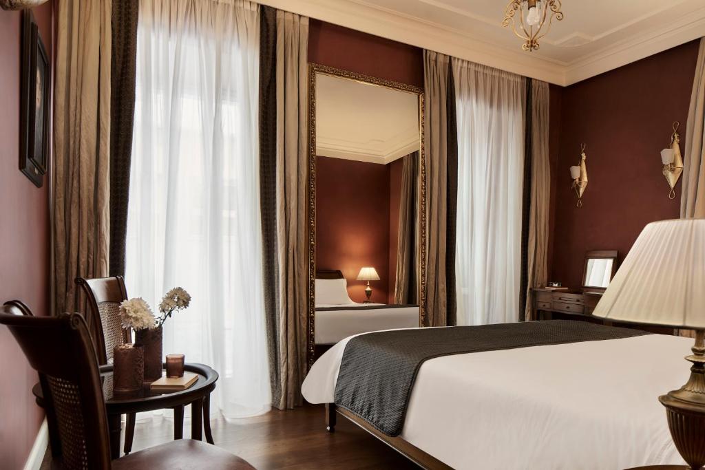 Postel nebo postele na pokoji v ubytování Hotel Ippoliti