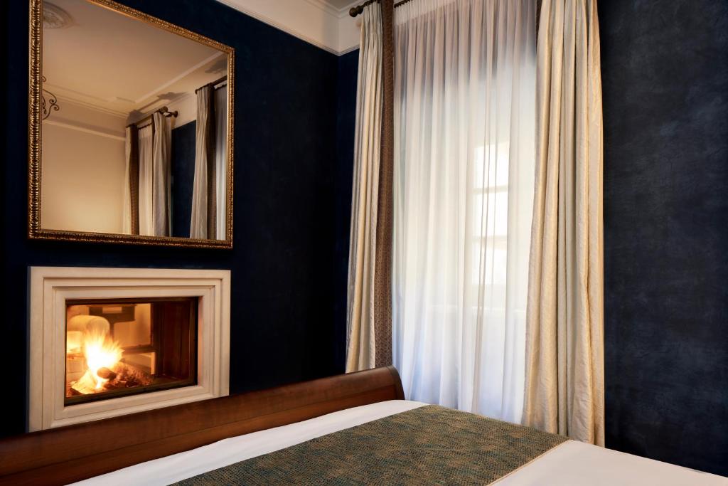 Postel nebo postele na pokoji v ubytování Hotel Ippoliti